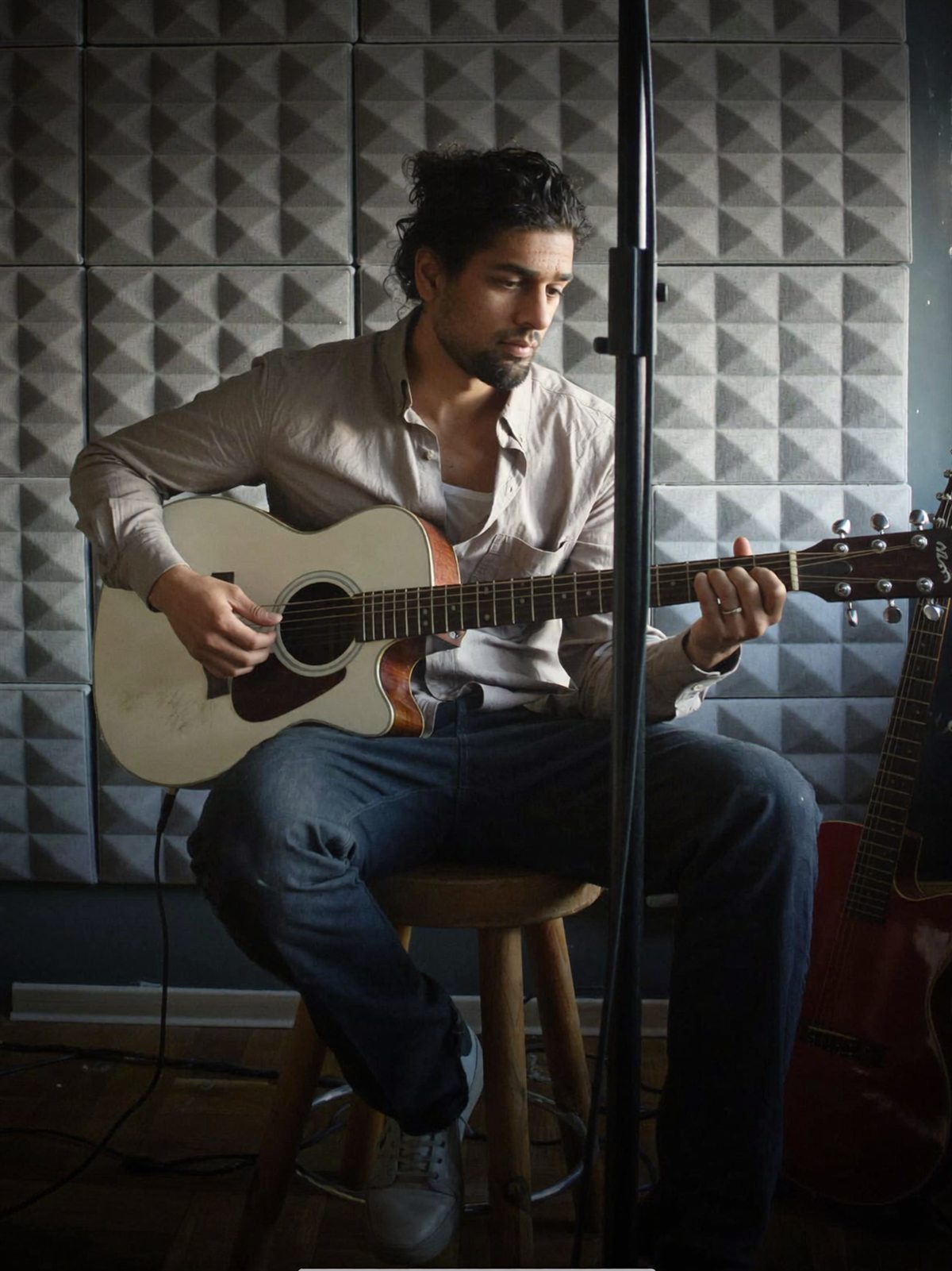 Senthuran with his guitar